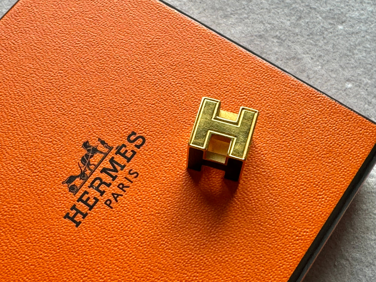 HERMES Gold Lacquered Cage d'H Pendant