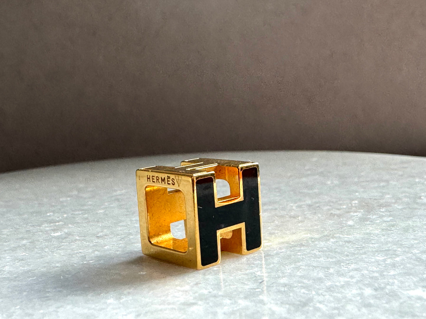 HERMES Gold Lacquered Cage d'H Pendant