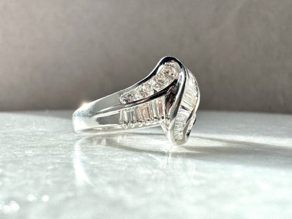 Platinum Ring with 1ct Baguette and Round Diamonds