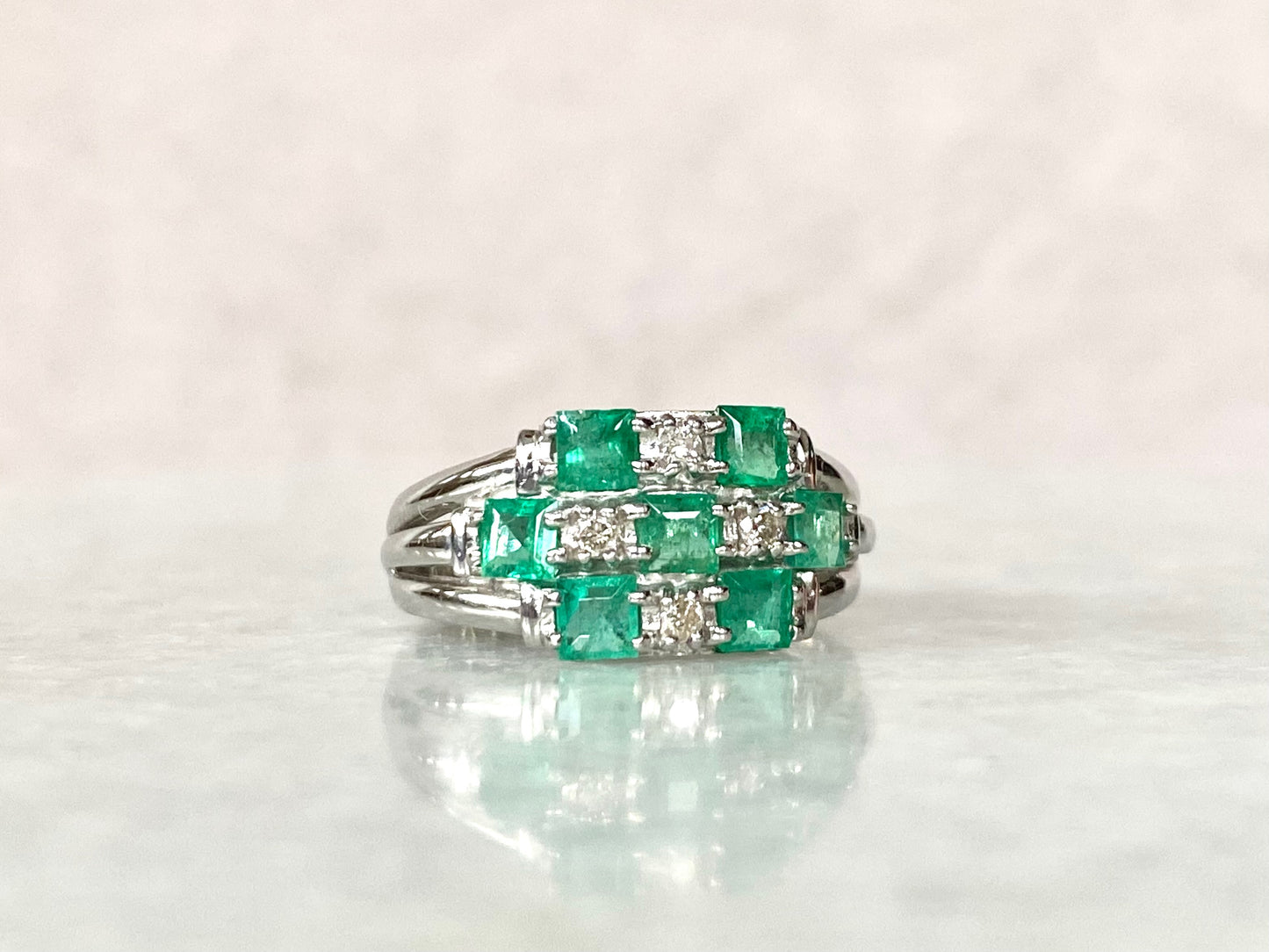 1ct Emerald and Diamond Ring in Platinum