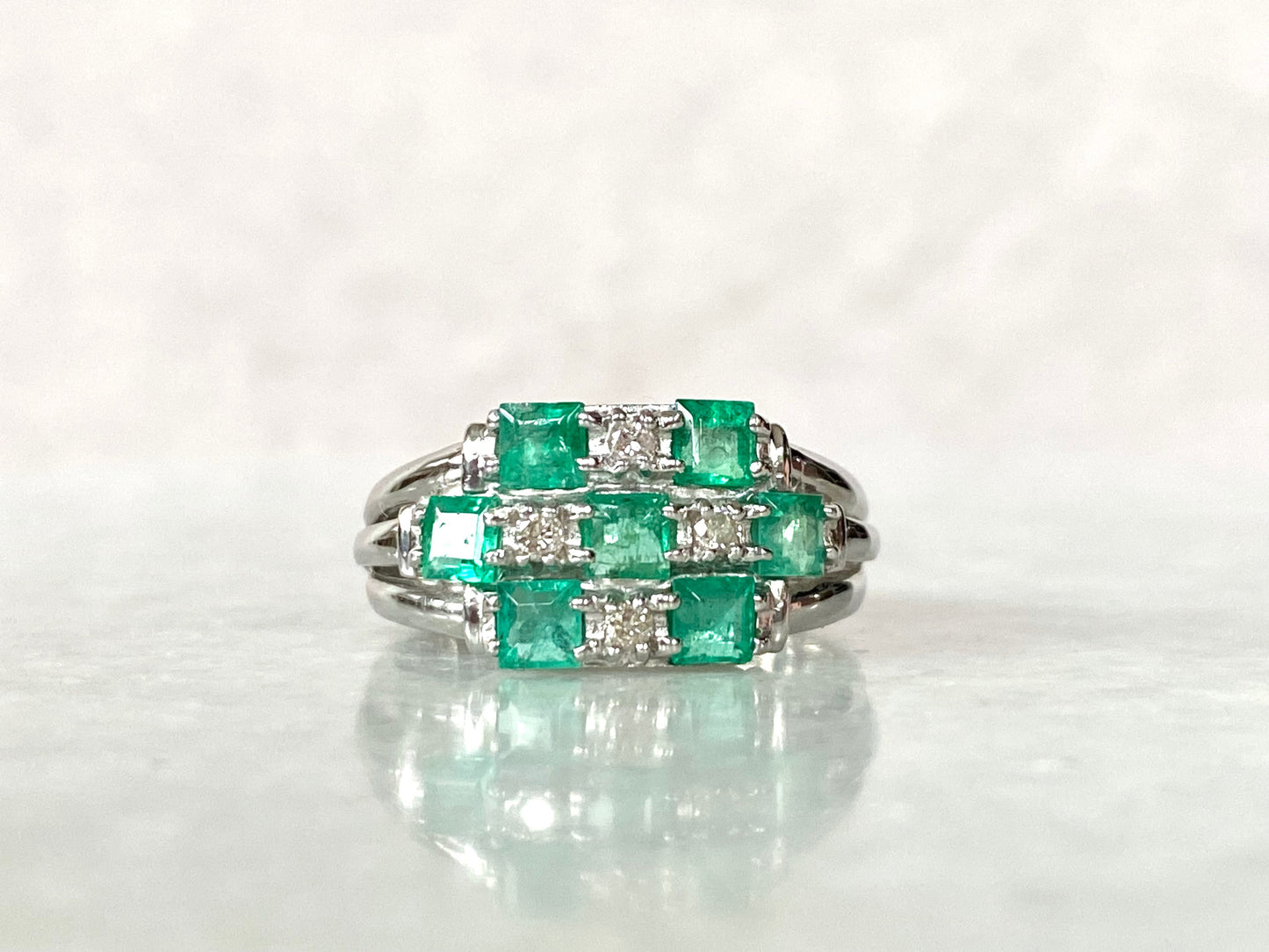 1ct Emerald and Diamond Ring in Platinum