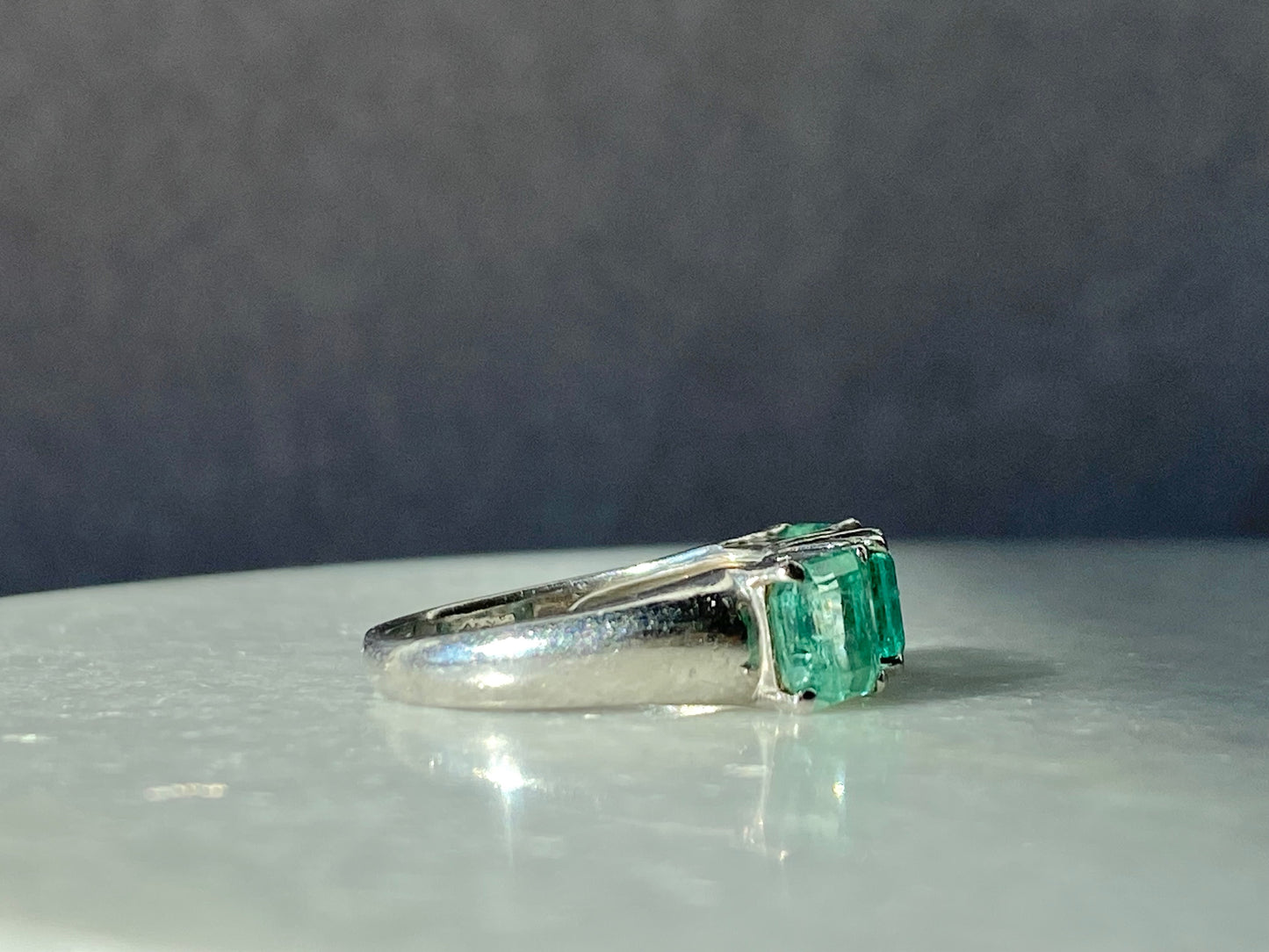 Emeralds and Diamonds Ring in Platinum