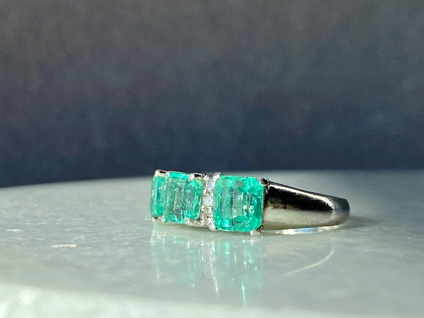 Emeralds and Diamonds Ring in Platinum