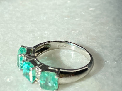 Emeralds and Diamonds Ring in Platinum