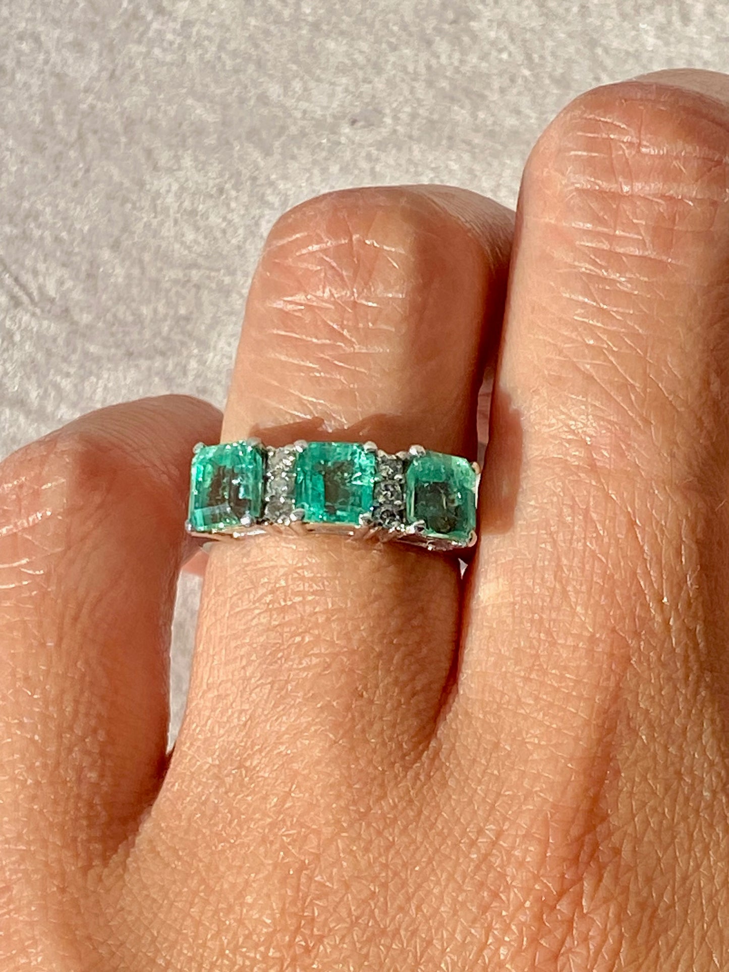 Emeralds and Diamonds Ring in Platinum